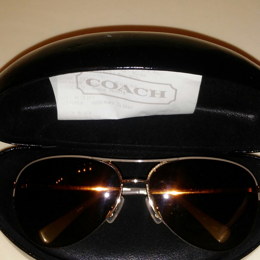 This is a pair of Coach sunglasses.